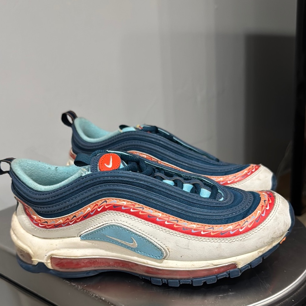 Nike Blue and Red Sneakers with Retro Wave Design